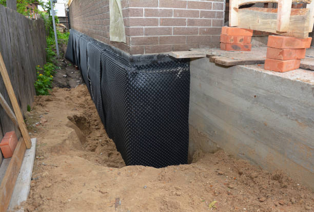 Happy homeowners after waterproofing job in Copperhill